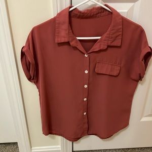 Coral button down short sleeve shirt.